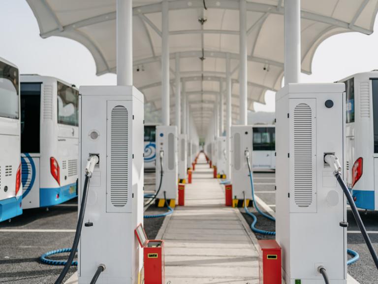 Rows of e-buses charging