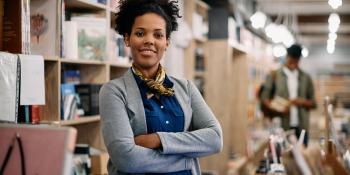 woman standing in bookshop