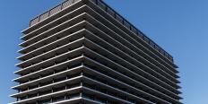 Street view of John Ferrero Building from South East Corner, during the day.